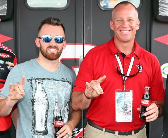 North Carolina State head football coach Dave Doeren, right, met defending Coca-Cola 600 winner Austin Dillon on Sunday prior to the 59th running of the Coca-Cola 600 at Charlotte Motor Speedway.
