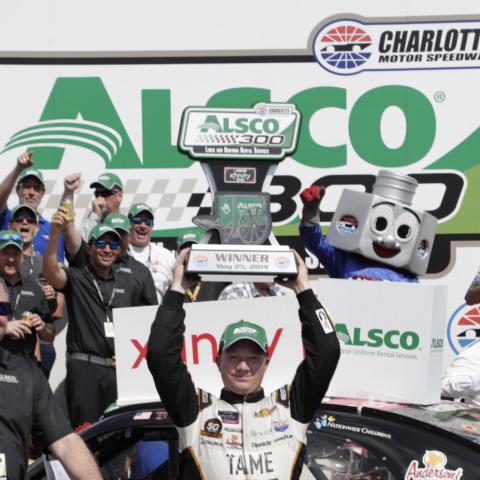 Tyler Reddick celebrates after winning Saturday's Alsco 300 at Charlotte Motor Speedway.