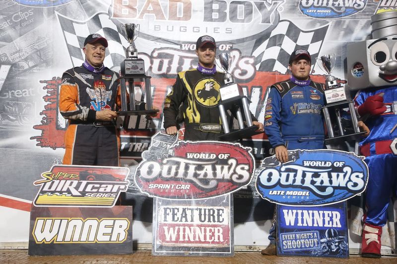 Danny Johnson, Dusty Zomer and Brandon Sheppard celebrate Friday feature wins at the Bad Boy Buggies World of Outlaws World Finals at The Dirt Track.