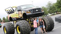 Fans pose with Sasquatch during the eighth annual Parade of Power at Charlotte Motor Speedway.