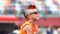 A young fan watches the pre-race festivities before the 57th running of the Coca-Cola 600 at Charlotte Motor Speedway.