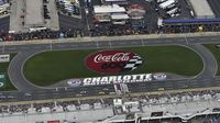 Drivers roll across the start/finish line to start the Coca-Cola 600 at Charlotte Motor Speedway.