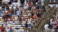 More than 600 military service men and women paraded through the grandstands as part of the speedway's Salute to the Troops military pre-race festivities during Sunday's running of the Coca-Cola 600 at Charlotte Motor Speedway.