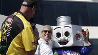 Charlotte Motor Speedway executive vice president Greg Walter and LugNut welcome fans during driver intros during Sunday's eliminations at the NHRA Carolina Nationals. 