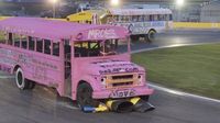 School buses race through Turn 4 during Round 6 of the Bojangles' Summer Shootout at Charlotte Motor Speedway.