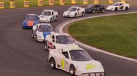 A pack of Bandoleros heads down the frontstretch of Charlotte Motor Speedway's quarter-mile during Round 6 of the Bojangles' Summer Shootout at Charlotte Motor Speedway.
