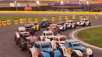 Semi-Pro drivers race side-by-side on a restart during Round 6 of the Bojangles' Summer Shootout at Charlotte Motor Speedway.