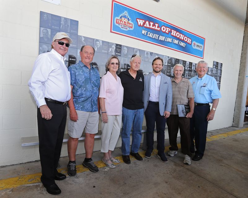  
NASCAR team owner Richard Childress, far left, joins Speedway Motorsports, Inc. President and Chief Executive Officer Marcus Smith (third from right) and NASCAR Hall of Famer Bobby Allison, right, alongside longtime fans (from left) Jim Hallman, Joanne Meade, Eugene McKeon and Ronnie Mounts at a Longtime Fans Breakfast Saturday at Charlotte Motor Speedway.