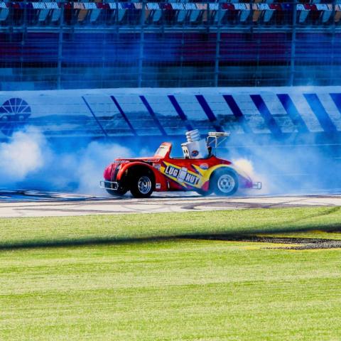 Lug Nut, the world's fastest mascot, will take on the winner of a Legend Car burnout contest during First Responders Night on Tuesday at the Bojangles' Summer Shootout.