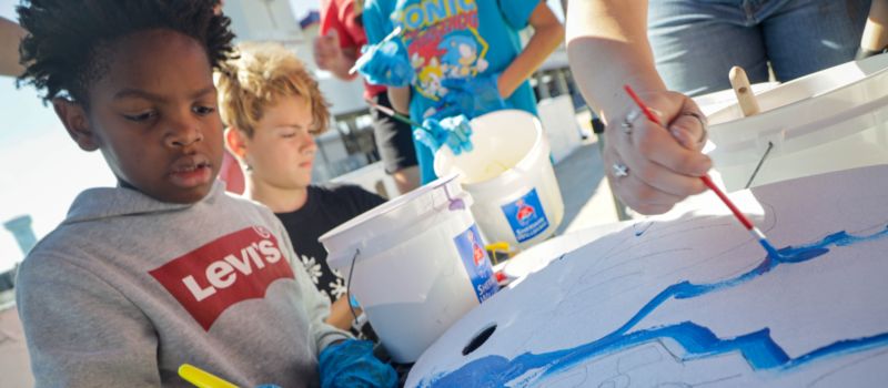 Students from Royal Oaks School of the Arts paint their "turtle" at Charlotte Motor Speedway as students from Cabarrus, Iredell and Mecklenburg counties took part in a special STEAM event at the famed 1.5-mile superspeedway ahead of the Oct. 7-9 Bank of America ROVAL 400 weekend.