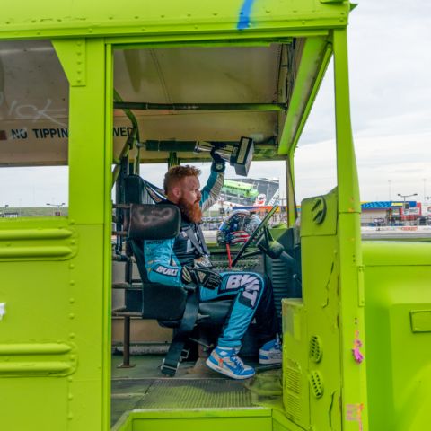 Multiply Church’s Zach Whitt let “Jesus, Take the Wheel” all the way to the checkered flag in the Cook Out Summer Shootout’s “Faster Pastor” school bus race. (Photo: Birdie O’Connell)