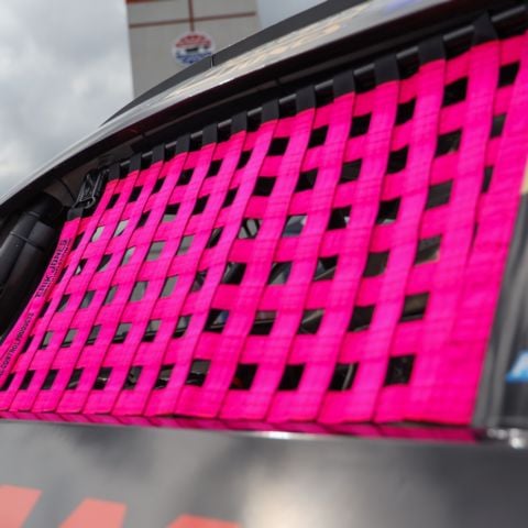 In honor of national Breast Cancer Awareness Month, NASCAR Cup Series drivers will run pink window nets at the Oct. 5 Bank of America ROVAL™ 400 as part of the Erik Jones Foundation “Windows of Hope” campaign. Following the race, the nets will be autographed and auctioned, with proceeds supporting area breast cancer nonprofits.