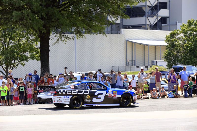 Crowds lined the entrance of Charlotte Motor Speedway to watch Ty Dillon and others in last year's Parade of Power.