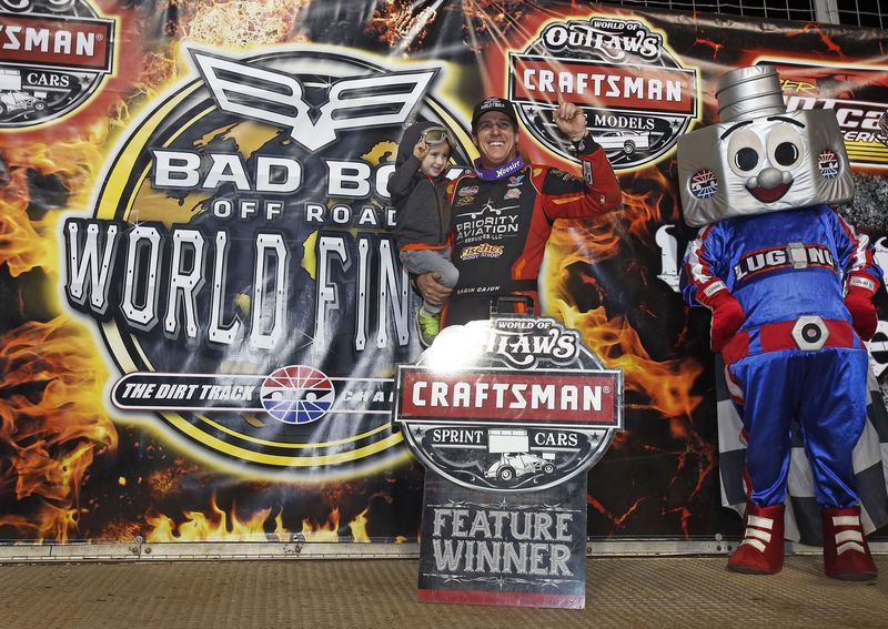 World of Outlaws Craftsman Sprint Car Series driver Jason Johnson celebrates after winning Friday's portion of the Bad Boy Off Road World of Outlaws World Finals at The Dirt Track at Charlotte.