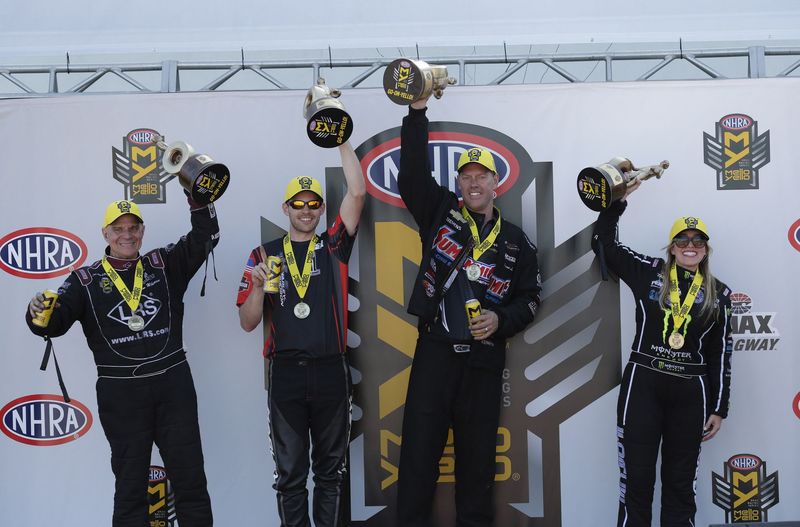 NHRA 4-Wide Nationals presented by Lowes Foods winners (from left) Tim Wilkerson, Andrew Hines, Jason Line and Brittany Force celebrate their victories on Sunday at zMAX Dragway. (CMS/HHP photo)