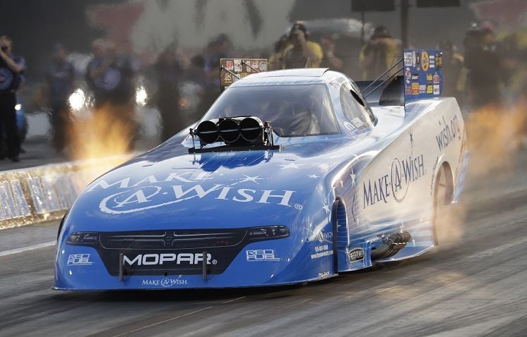 Tommy Johnson Jr. kicked off the NHRA Carolina Nationals with a Funny Car track-record 3.876-second pass during qualifying on Friday at zMAX Dragway.