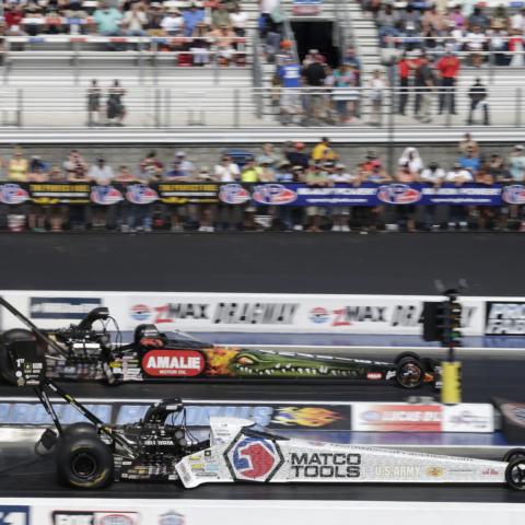 Antron Brown (bottom car) will chase his sixth zMAX Dragway Wally in this weekend's NHRA Carolina Nationals.
