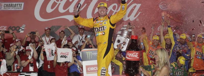 Kyle Busch celebrates after winning Sunday’s Coca-Cola 600 at Charlotte Motor Speedway, Busch's first points-paying victory at Charlotte in NASCAR's premier series.