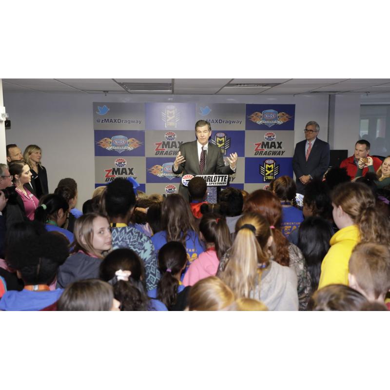 North Carolina Gov. Roy Cooper speaks to students during a STEM tour on Tuesday at zMAX Dragway. Cooper's visit was part of the Students@Work program. 