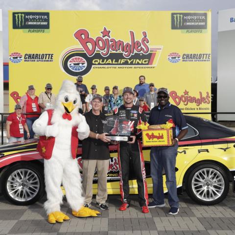 Kurt Busch, third from left, celebrates after winning the pole for Sunday's Bank of America ROVAL™ 400 on the Charlotte Motor Speedway ROVAL™.