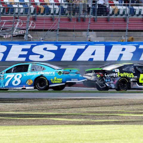 Martin Truex Jr. (78) and Jimmie Johnson spun out coming to the finish line on Sunday.