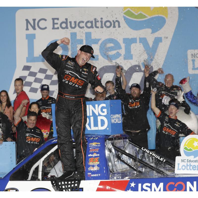 Johnny Sauter celebrates after winning Friday's North Carolina Education Lottery 200 NASCAR Camping World Truck Series race at Charlotte Motor Speedway.