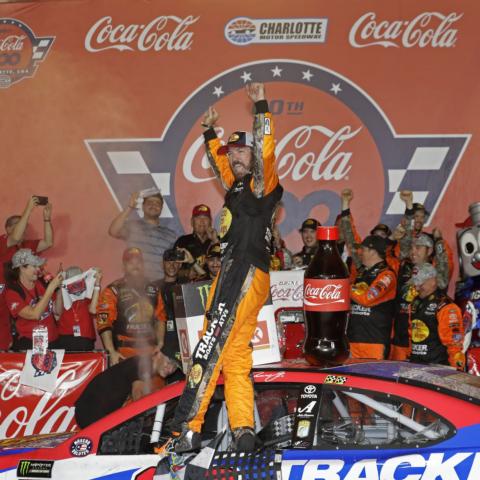 Martin Truex Jr. celebrates after winning Sunday's Coca-Cola 600 at Charlotte Motor Speedway. The win marked Truex's second in the historic event.