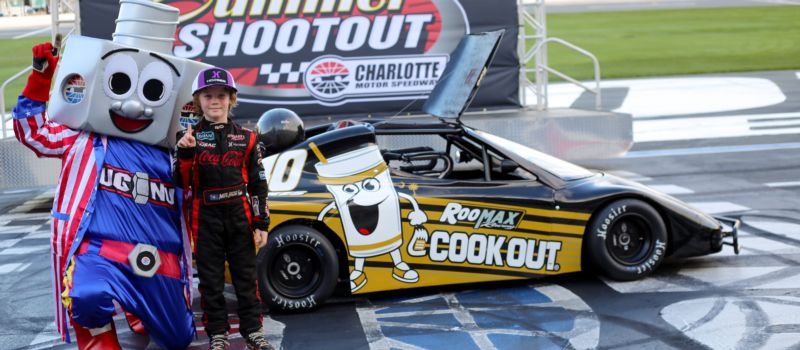 Roo Reaves celebrates his Beginner Bandolero win with Lug Nut at America’s Home for Racing.