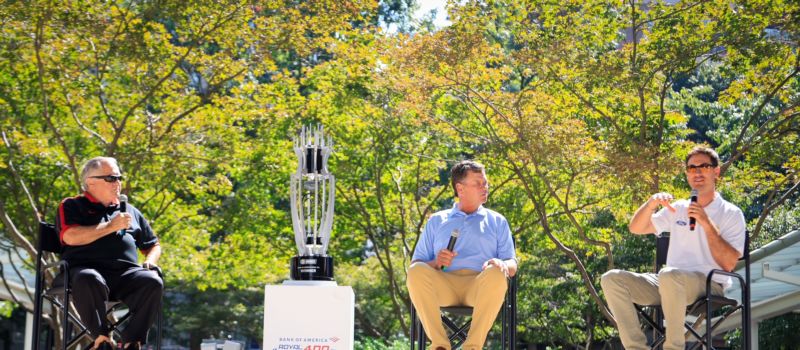 (Right to left) Joey Logano, two-time NASCAR Cup Series champion, and Michael Waltrip, two-time Daytona 500 winner and motorsports analyst, joined Doug Rice to preview the upcoming weekend at the Bank of America ROVAL™ 400 Uptown pep rally on Tuesday. (CMS/HHP photo)