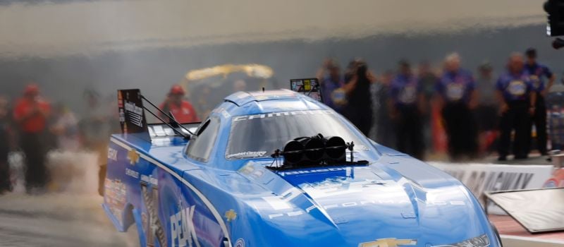 Sixteen-time NHRA Funny Car champion John Force sets the record with a 3.820-second pass – the 10th quickest in the history of the category – in the second round of NHRA 4-Wide Nationals qualifying. 