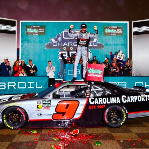 Ross Chastain celebrates after winning Saturday's Charbroil 300 NASCAR O'Reilly Auto Parts Series race at Charlotte Motor Speedway.