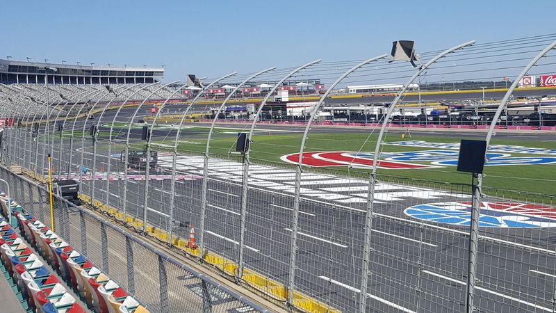 Panasonic Wi-Fi modules line the frontstretch fence at Charlotte Motor Speedway ahead of this weekend's Bank of America 500. The speedway will test an Ultra-high density Wi-Fi system this weekend in select frontstretch seating areas.