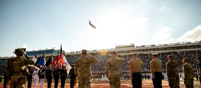 Representatives from each branch of the U.S. Armed Forces take part in the pre-race salute to the U.S. Armed Forces ahead of the Coca-Cola 600.