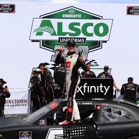 Ty Gibbs celebrates after winning the NASCAR Xfinity Series' Alsco Uniforms 300 on Saturday at Charlotte Motor Speedway.