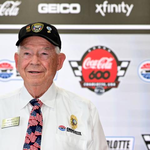 Longtime security guard Luther Fincher is recognized during a press conference on Sunday at Charlotte Motor Speedway.