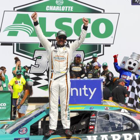 Josh Berry celebrates after winning Saturday's Alsco Uniforms 300 NASCAR Xfinity Series race at Charlotte Motor Speedway. 