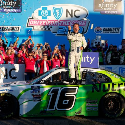 A.J. Allmendinger celebrates after winning Saturday’s Drive for the Cure 250 presented by Blue Cross Blue Shield of North Carolina on the Charlotte Motor Speedway ROVAL™. (HHP/Harold Hinson photo)