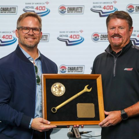 Longtime NASCAR crew chief, mechanic, team executive and television personality Andy Petree, right, was presented with the Smokey Yunick Award on Sunday by Speedway Motorsports President and CEO Marcus Smith, prior to the Bank of America ROVAL™ 400. 