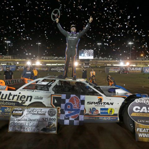 Jonathan Davenport celebrates after winning Saturday's World of Outlaws CASE Construction Equipment Late Models feature on Saturday at The Dirt Track at Charlotte.