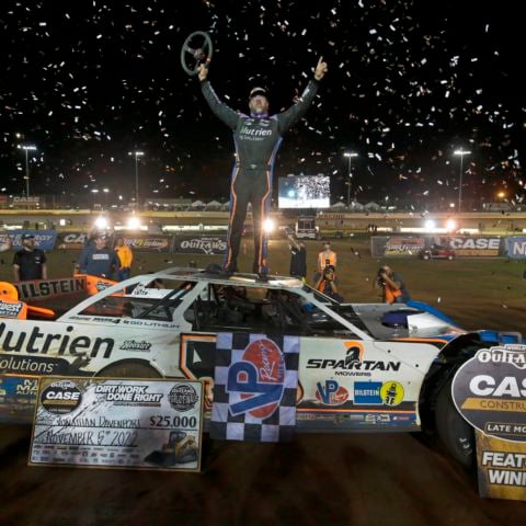 Jonathan Davenport celebrates after winning Saturday's World of Outlaws CASE Construction Equipment Late Models feature on Saturday at The Dirt Track at Charlotte.