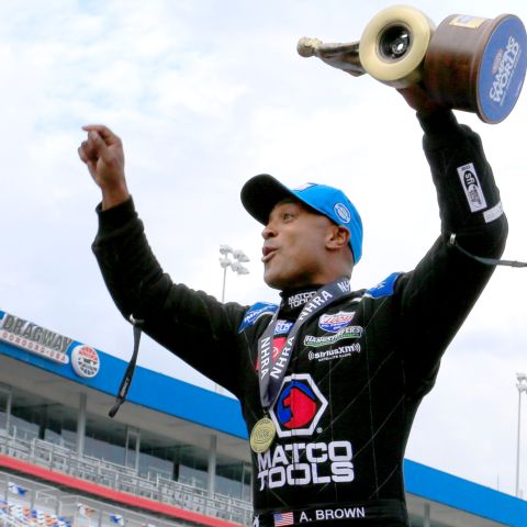 Antron Brown celebrates after winning Sunday’s Top Fuel eliminations in the Betway NHRA Carolina Nationals at zMAX Dragway. 