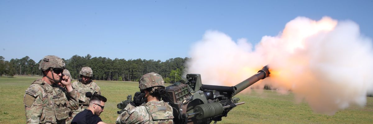 Richard Childress Racing's Paul Swan fires a 105mm M119A2 Howitzer during a Mission 600 visit to the 82nd Airborne Division at Fort Bragg on Wednesday, April 19, 2023.