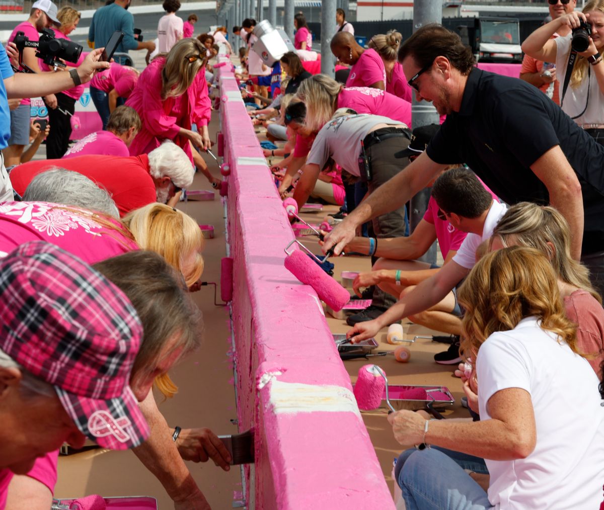 NASCAR Drivers Team with Breast Cancer Survivors Paint Pit Wall Pink, CMS  in the Community, Community