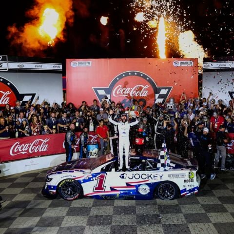 Ross Chastain celebrates after winning Sunday's Coca-Cola 600 NASCAR Cup Series race at Charlotte Motor Speedway.