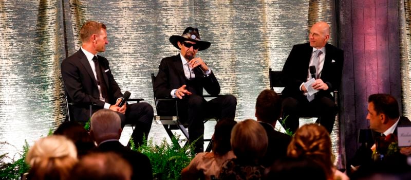 Emcees Clint Bowyer and Adam Alexander share stories with gala honoree and NASCAR Hall of Famer Richard Petty during the 43rd annual Speedway Children's Charities Gala at Ten Tenths Motor Club on Wednesday. The event raised a record $1.5 million for local charities. 