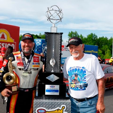 Shawn Langdon being presented with a specialty trophy from “Big Daddy” Don Garlits following his Top Fuel win last year – the 1,000th NHRA Top Fuel race in history. 