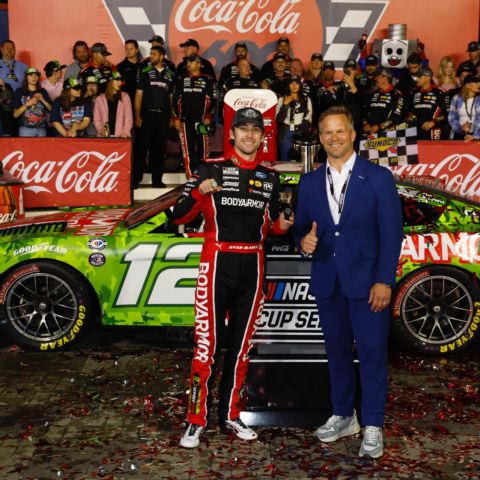 Ryan Blaney, left, poses with Speedway Motorsports President and CEO Marcus Smith after Blaney won Monday's Coca-Cola 600 at Charlotte Motor Speedway. 