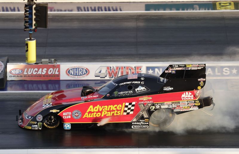 Courtney Force set a zMAX Dragway Funny Car record in elapsed time with a 3.851-second pass during Friday qualifying for the NHRA Four-Wide Nationals.