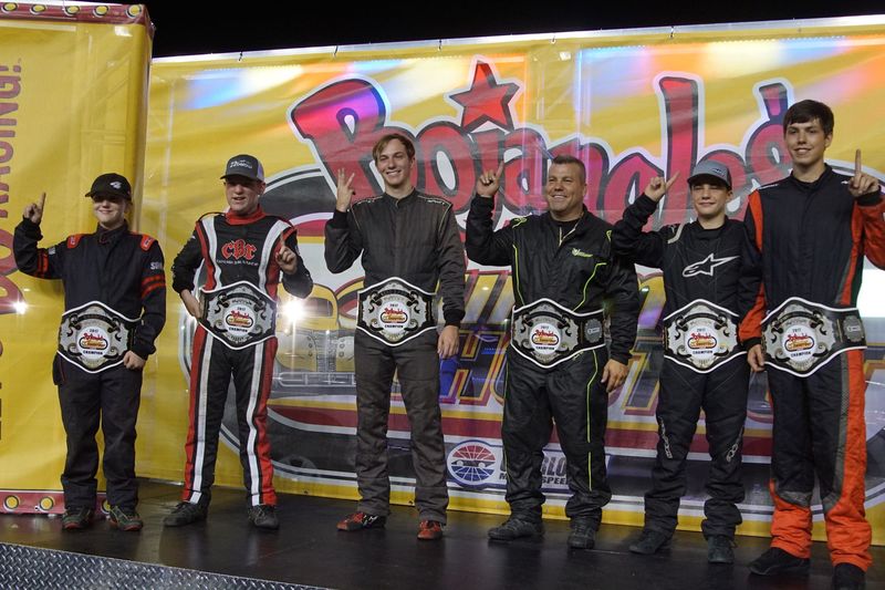 Jordan Black, third from left, joined fellow Bojangles' Summer Shootout champions (from left) Leland Honeyman, Cameron Bolin, Todd Midas, Sam Mayer and Zach Miller on the stage in Tuesday's season finale at Charlotte Motor Speedway.