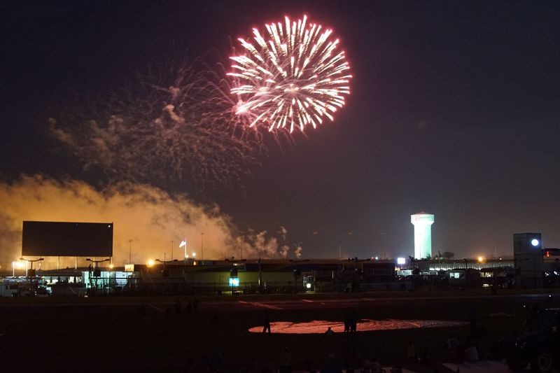 Fireworks illuminate the night sky on Tuesday during a July 4 fireworks show in the Bojangles' Summer Shootout at Charlotte Motor Speedway.